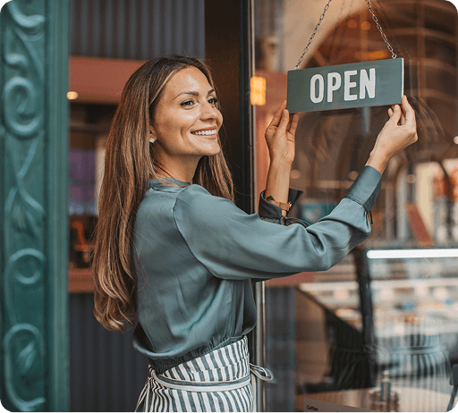 Girl opening shop door